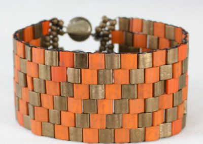 pulsera ajedrez naranja y bronce