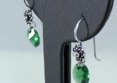 Pendientes corvus verdes perfil